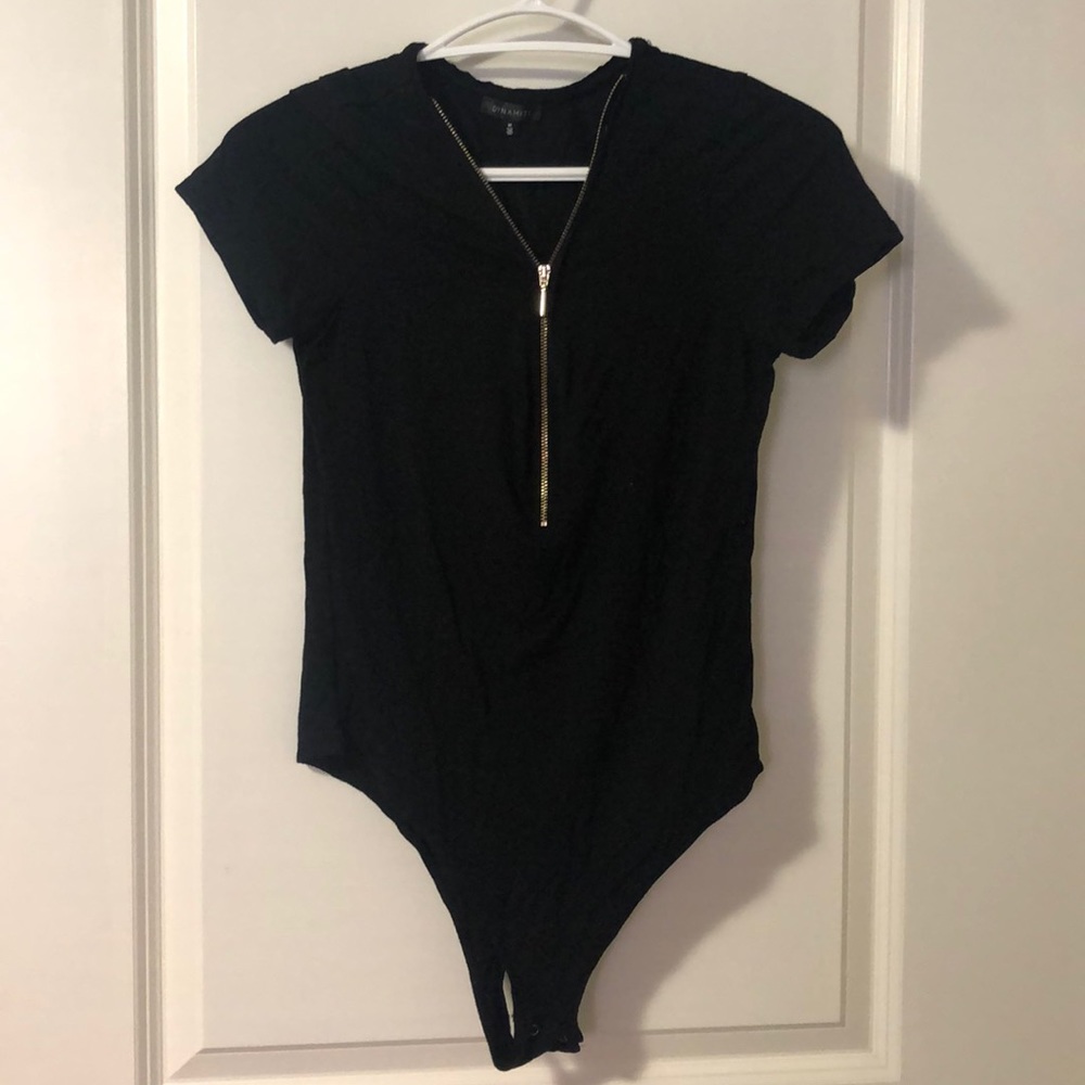 Black short sleeve body suit with gold zipper